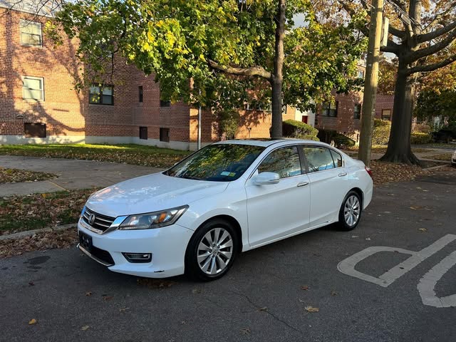 White sedan previously purchased by We Buy Cars NY
